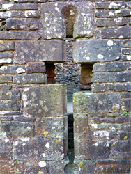 Masonry around an arrowslit